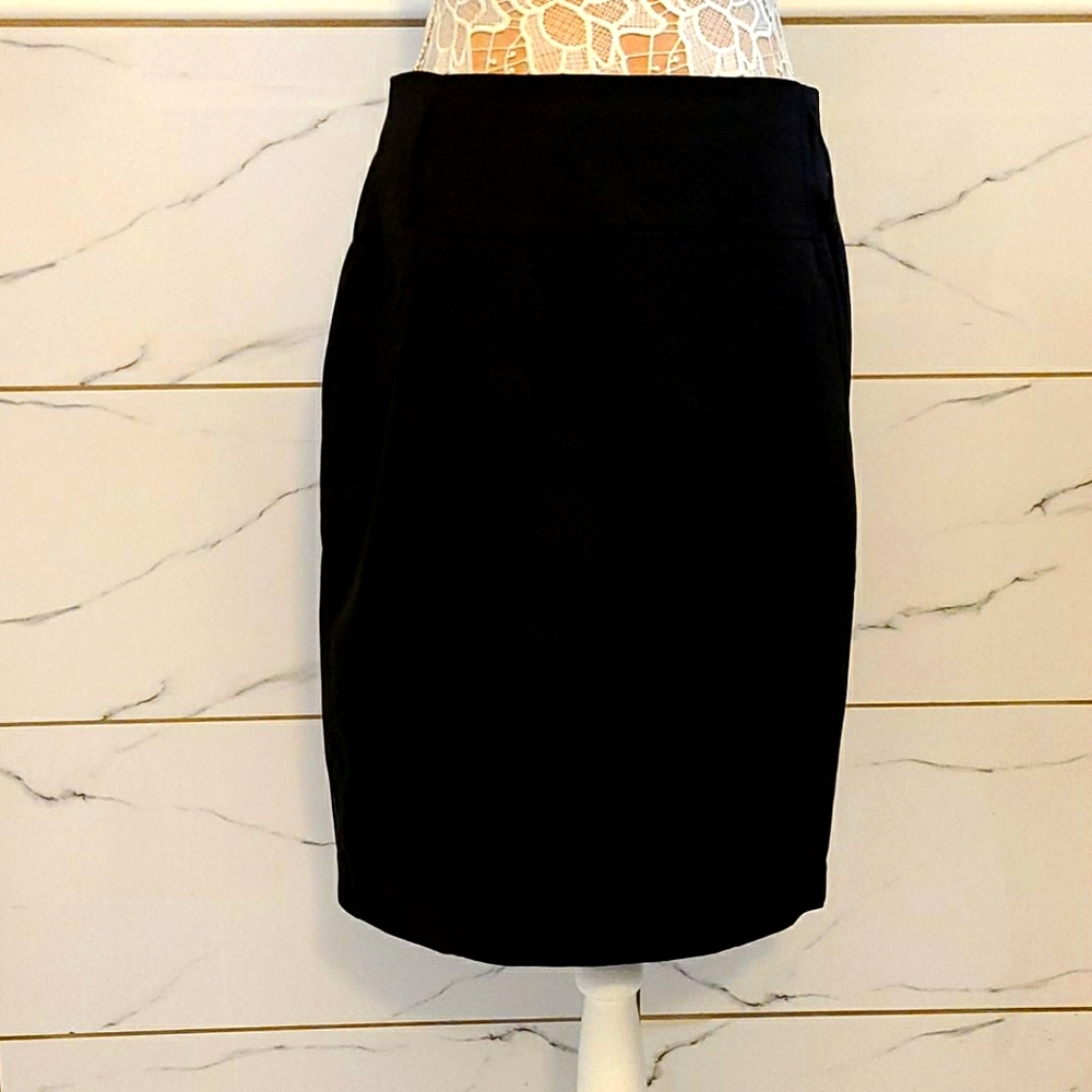 Black fully lined pencil skirt with back slit and